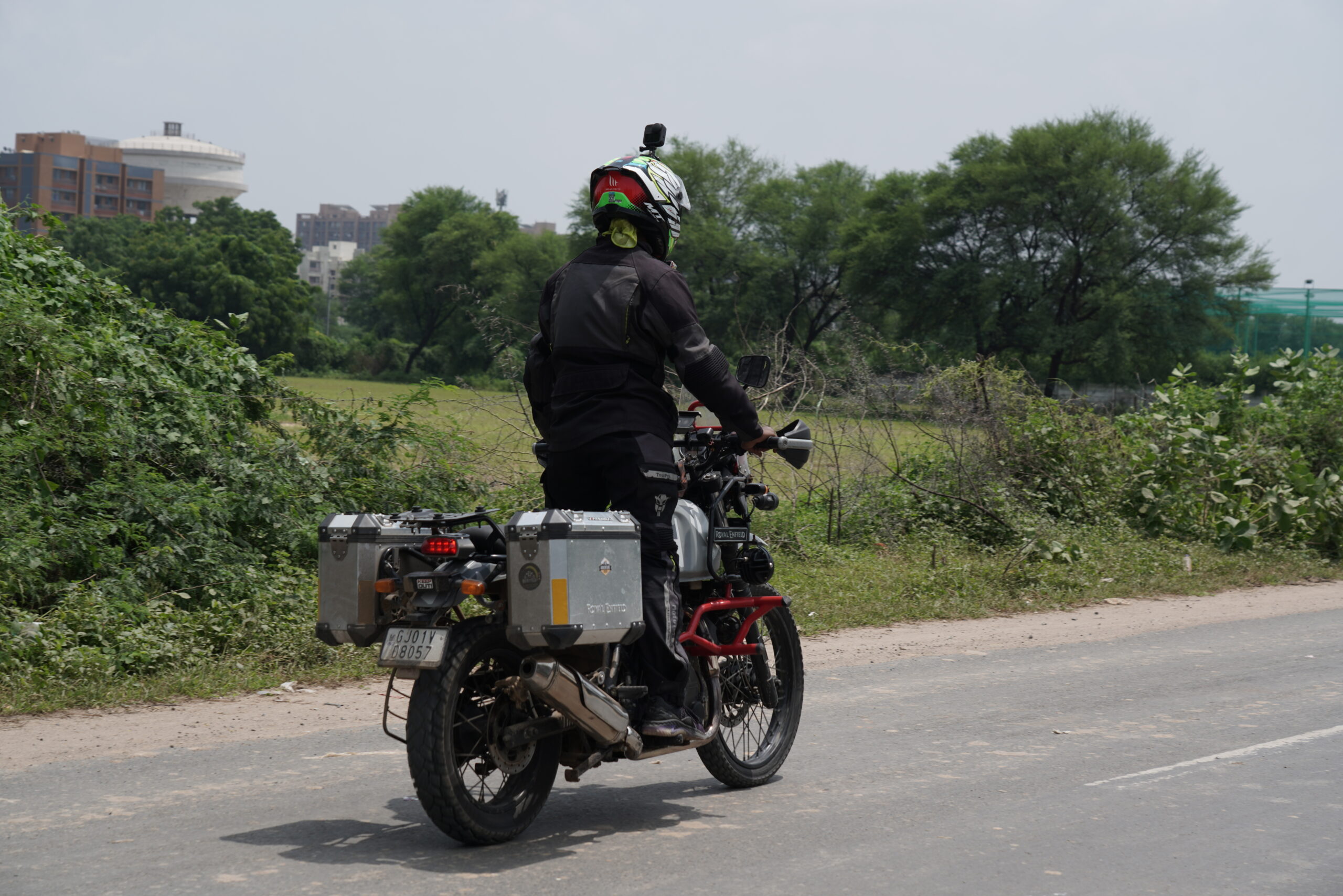 Motorcycle rider on bike doing stunts